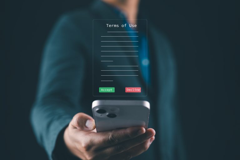 Person reviewing terms and conditions with a legal adviser in Australia.