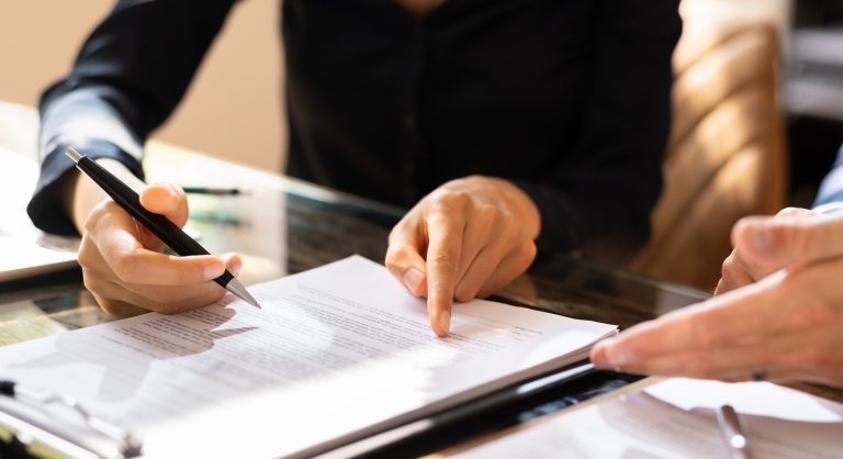 Person seeking a solicitor’s guidance on understanding contract clauses in Australia.