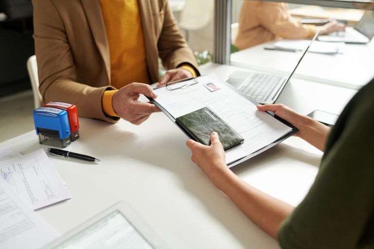 Person reviewing documents for an Australian immigration appeal