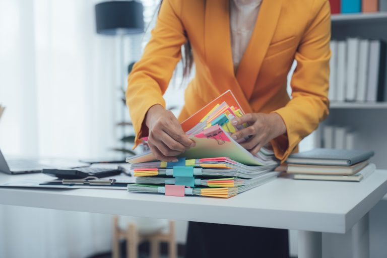 Lawyer reviewing a commercial contract document on a desk