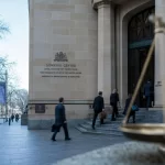 Featured image for What Are the Latest Trends in Bail Applications in Australia? - A bustling Australian courthouse exterior