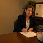 Featured image for How Does the Family Law ACT 1975 Affect Parenting Orders? - A warmlit solicitors office features an experi