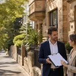 Featured image for How to Handle Rent Increases in NSW Today - A sunny Sydney street scene featuring a classic sandstone apar