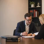Featured image for How to Handle Debt Recovery in Australia? - A modern Australian legal office with a financial professional